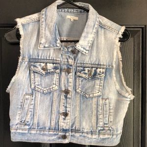 Cropped, cut off sleeve jacket vest